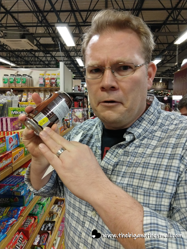 Joel with soda can.png